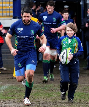 Andy Rose with Youth Player Mascot
